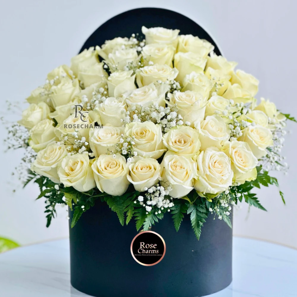 White Roses In A Black Box