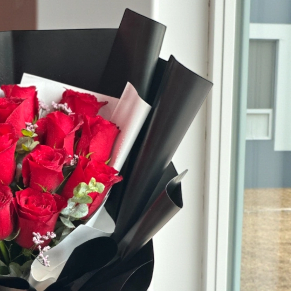 A bouquet of 11 red roses nice wrapping