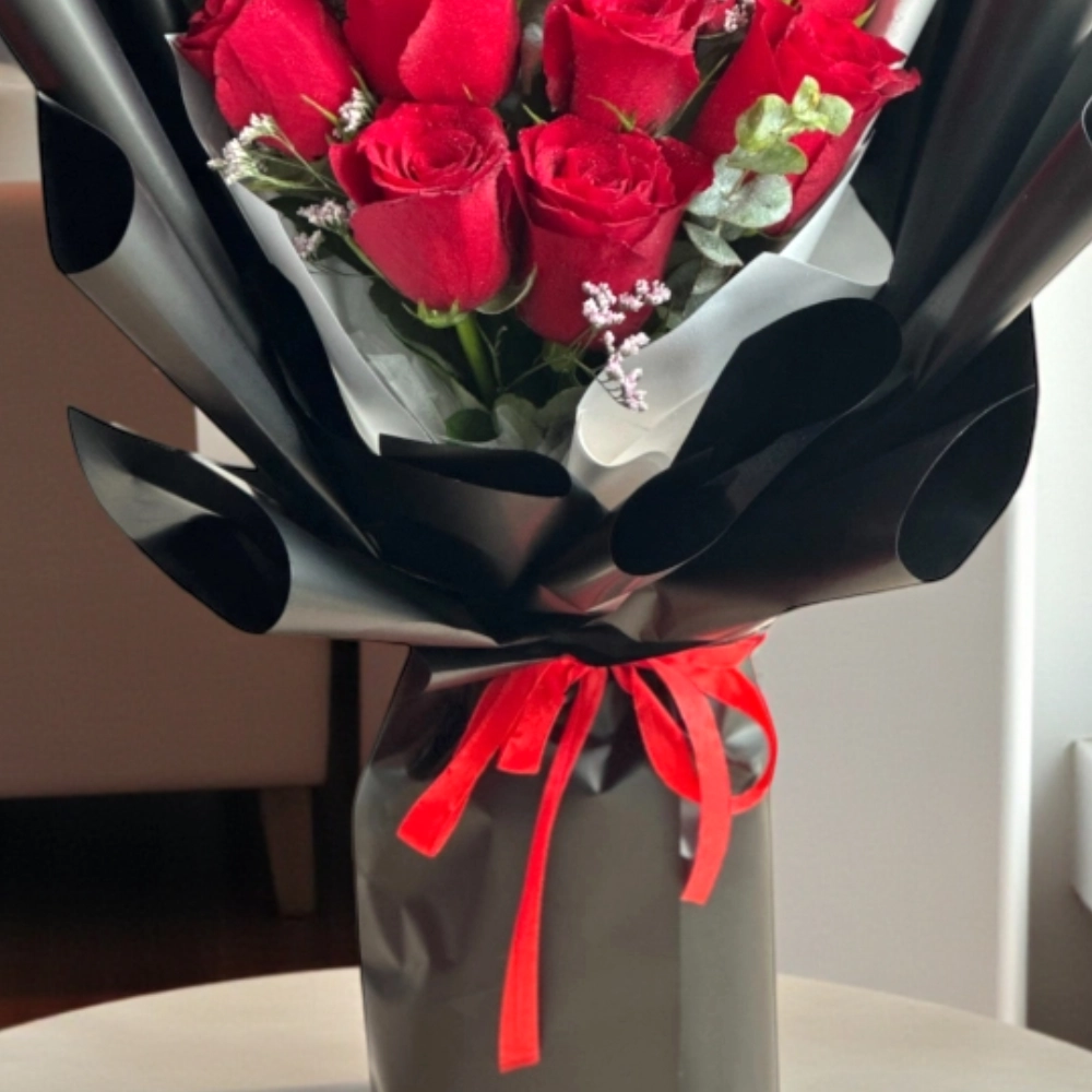 A bouquet of 11 red roses nice wrapping