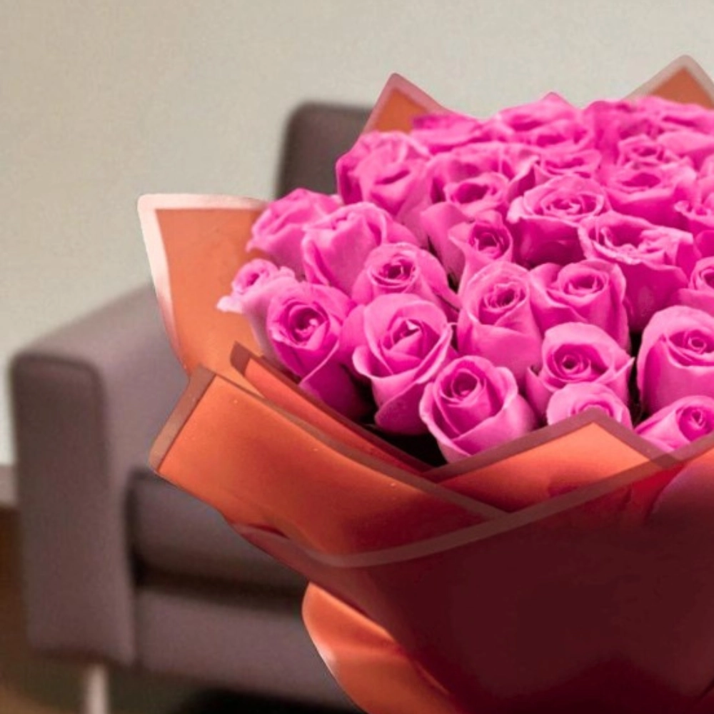 A bouquet of 50 pink roses in a nice wrapping