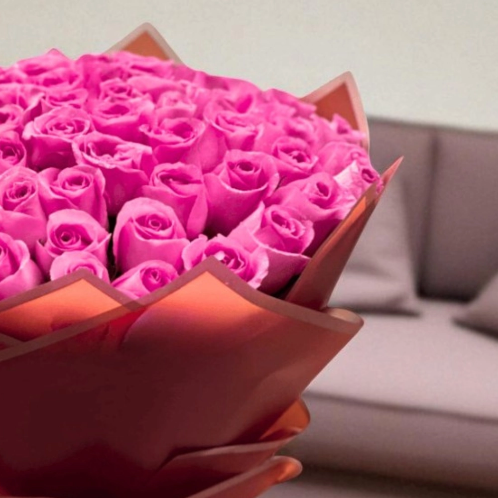 A bouquet of 50 pink roses in a nice wrapping