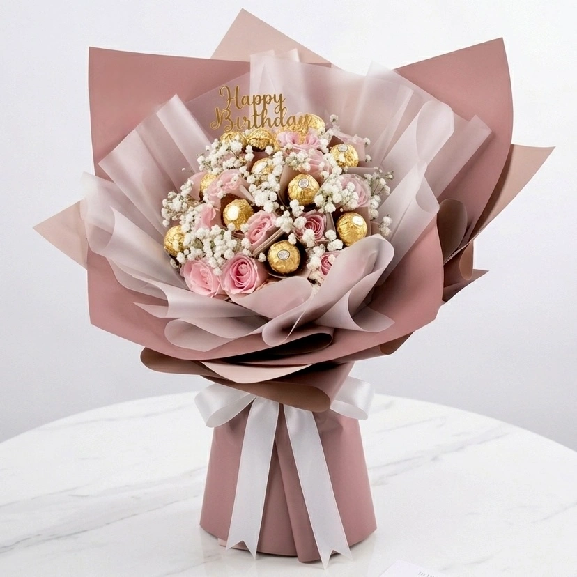 15 pink roses and 11 Ferrero Rocher chocolates bouquet arranged in elegant premium wrapping