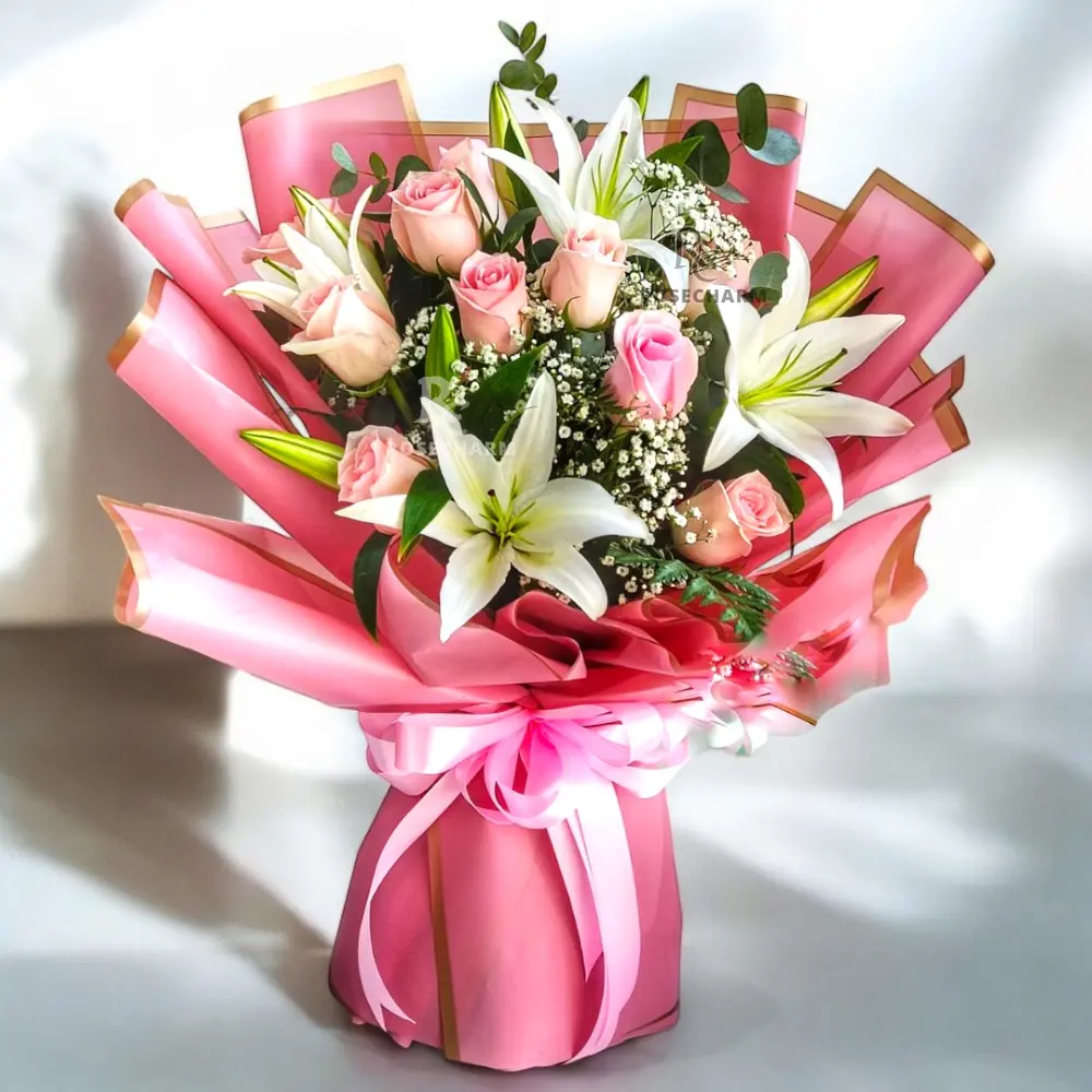 Bouquet of pink roses and lilies in a nice wrapping