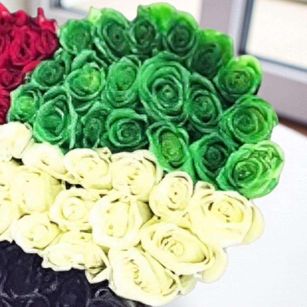 Arrangement of 100 UAE flag color roses in a heart shape