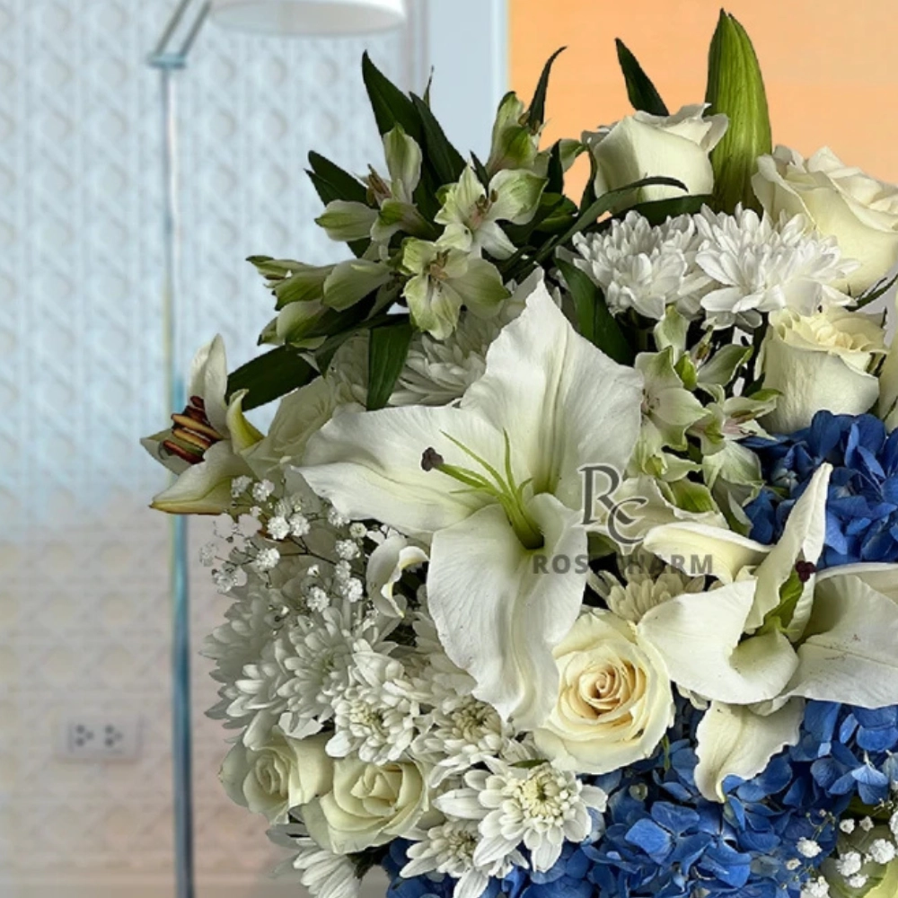 white and blue flowers arrangement