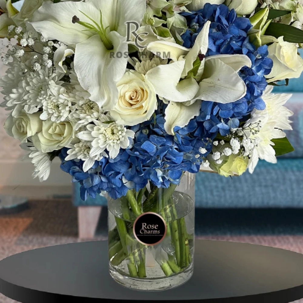 white and blue flowers arrangement