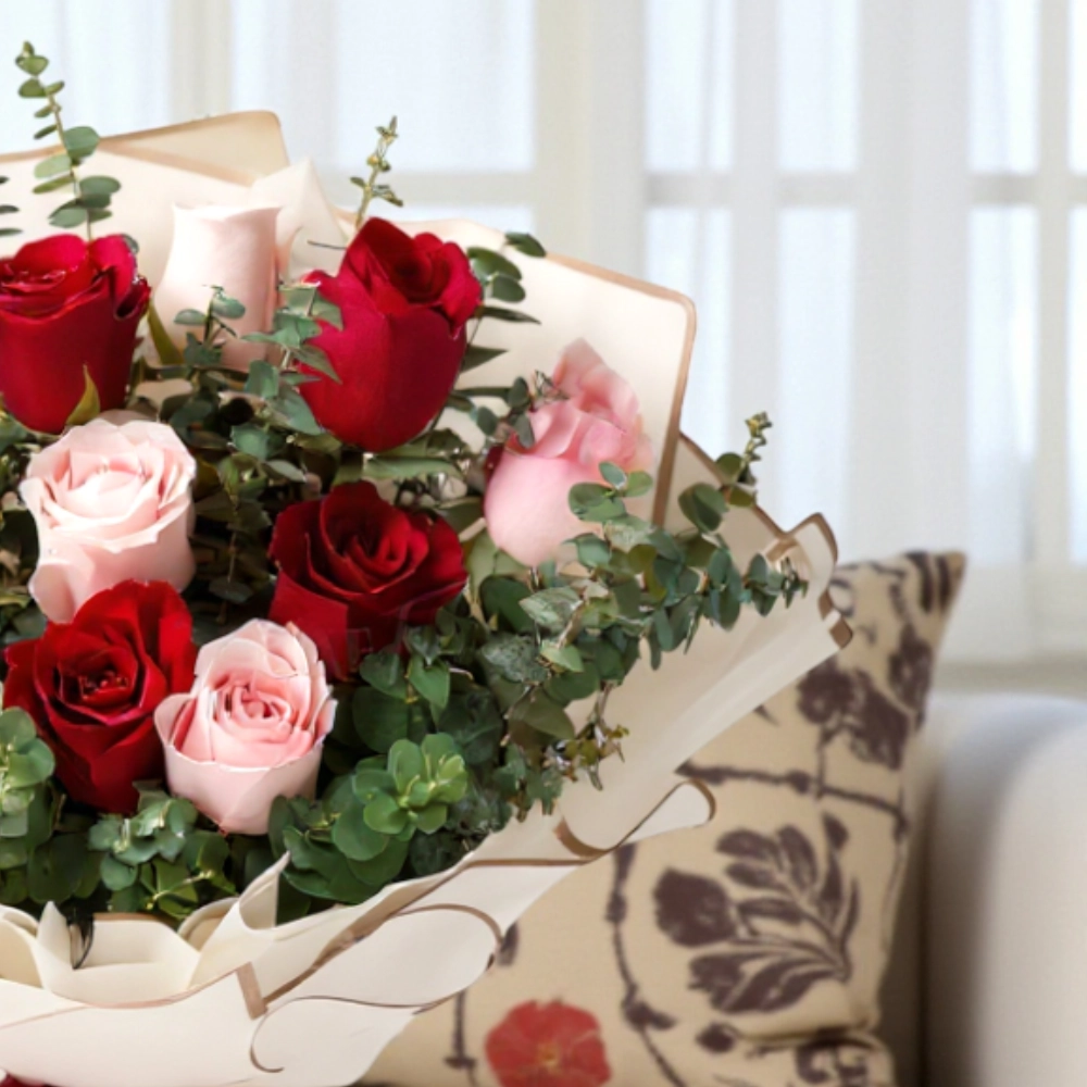 A Bouquet of 12 red and pink roses in a nice wrapping