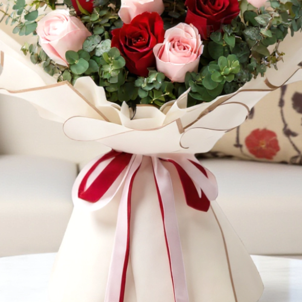 A Bouquet of 12 red and pink roses in a nice wrapping