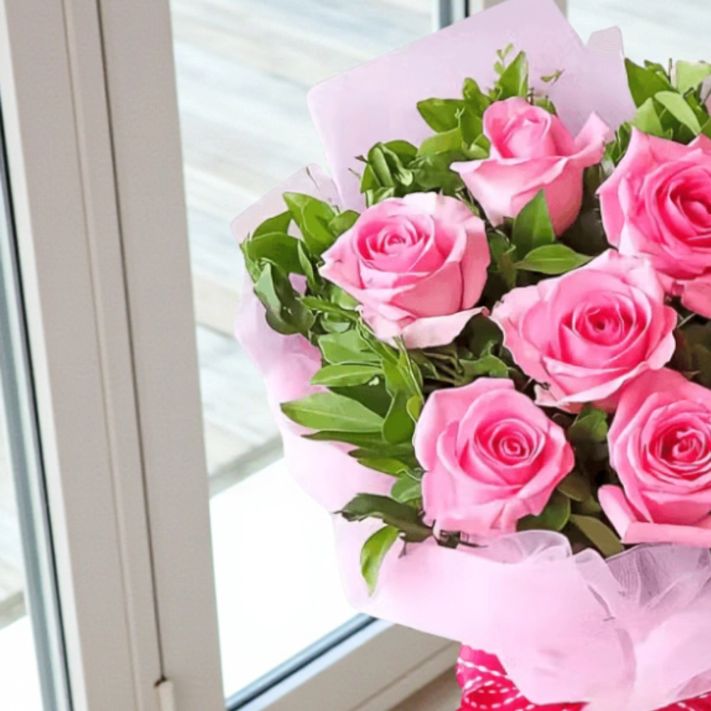 Bouquet of 10 pink roses in a nice wrapping