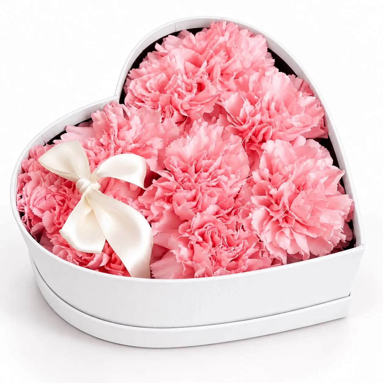 Romantic 11 pink carnations arranged in a heart shaped gift box, a lovely floral surprise from RoseCharmFlowers