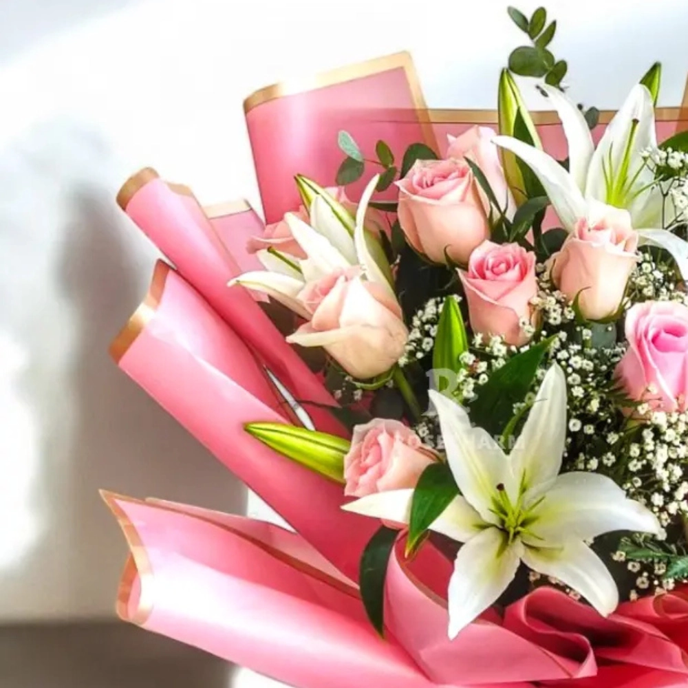 Bouquet of pink roses and lilies in a nice wrapping