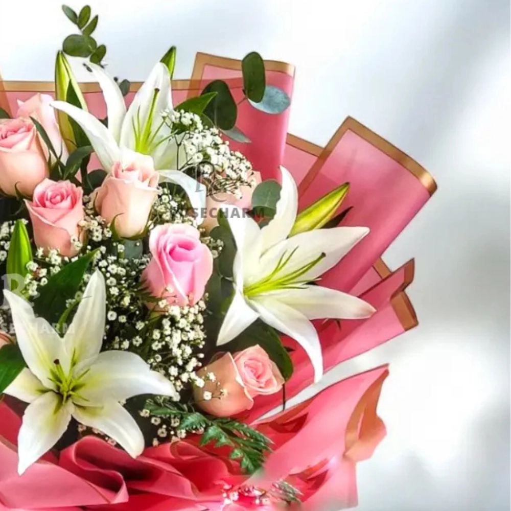 Bouquet of pink roses and lilies in a nice wrapping