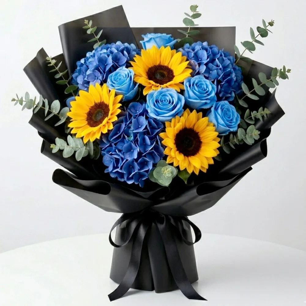 Beautiful bouquet with blue roses blue hydrangeas and bright sunflowers arranged as a special Father's Day gift for dad